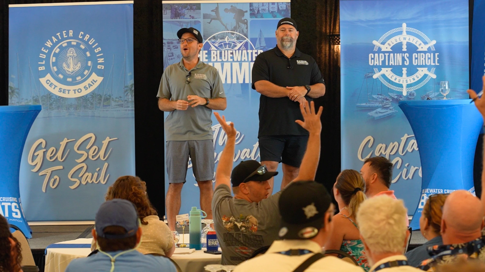 Chris and Keith speaking on stage at the Bluewater Summit